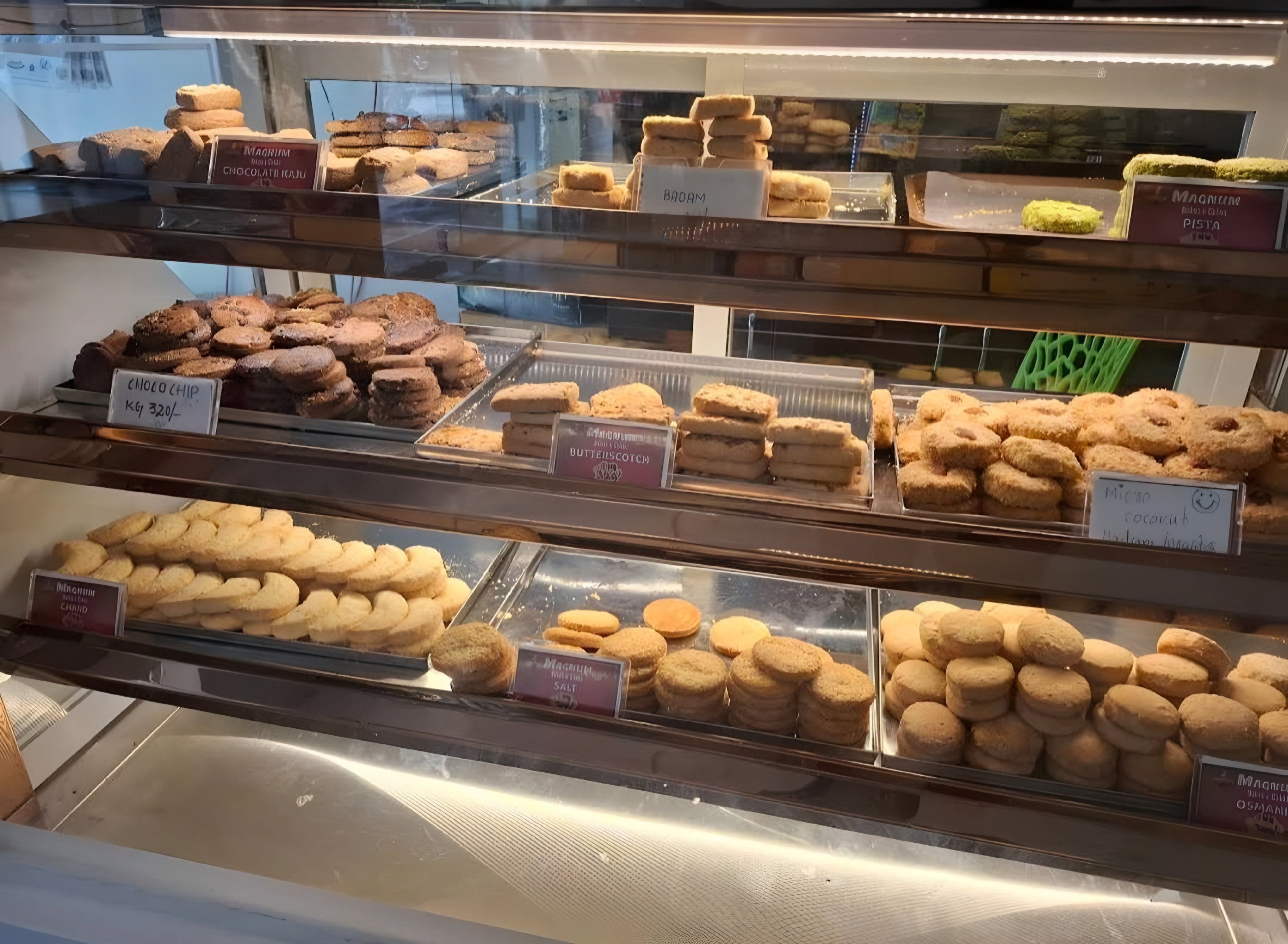 Freshly baked biscuits counter — Osmani, Choco Chip, Butterscotch, Pista, Badam varieties